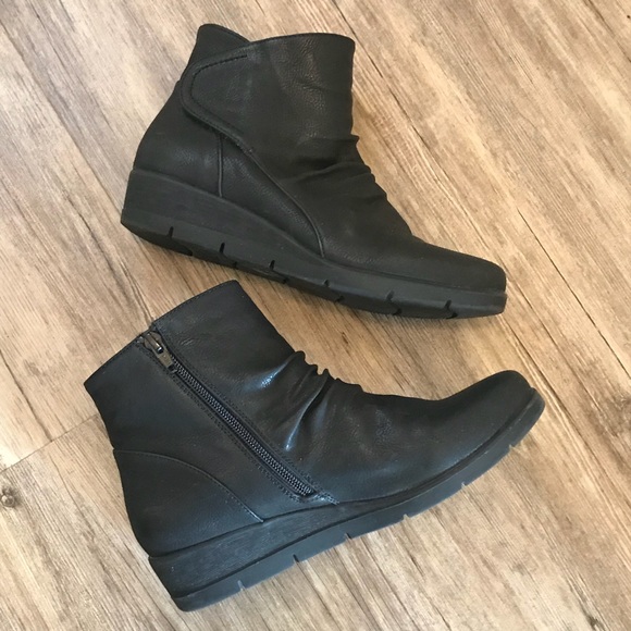 cliffs by white mountain black boots